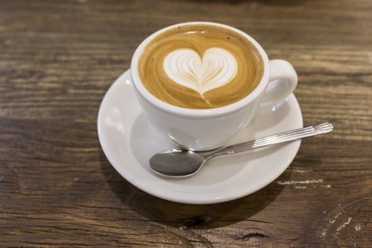 Cup of coffee on a table photo