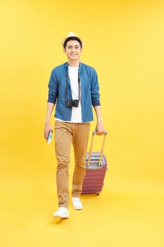 Portrait of Asian man travel in Isolated background with gesture sign photo