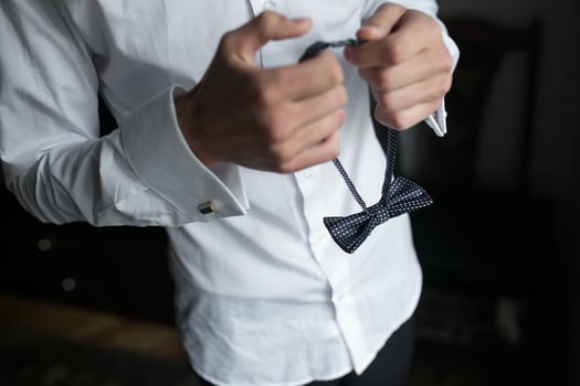 Groom preparing for Wedding photo