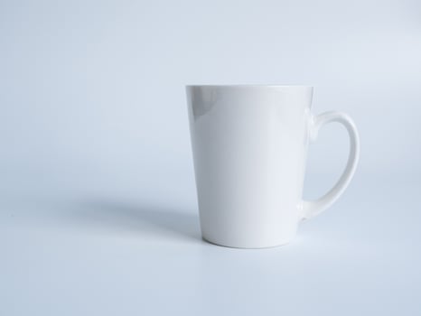 White coffee cup top view photograph On a white saucer The inside of the glass looks empty. Waiting for hot coffee to be refilled to drink to feel refreshed and alert on a white background. photo