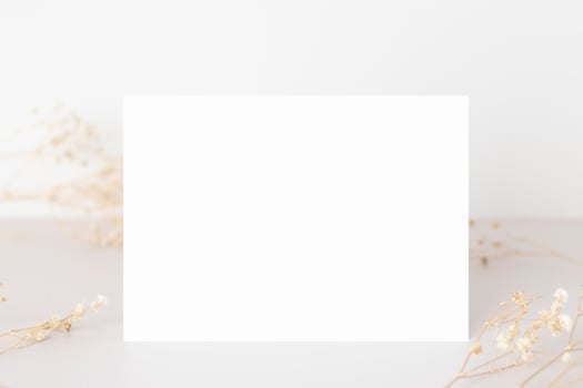 Greeting card mockup with dry leaves and branch  wedding cards  birthday card  Mockup for design photo
