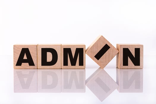 The word ADMIN concept is written on wooden cubes, on a white background with reflection. photo