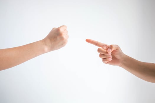 Hammer or rock symbol and nail symbol in playing rock paper scissors game on white background. photo