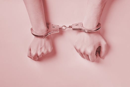 Male and female hands in handcuffs. Love forever. photo