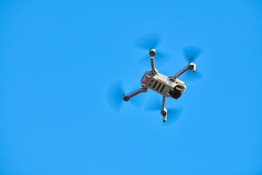 Quadcopter drone in sky photo