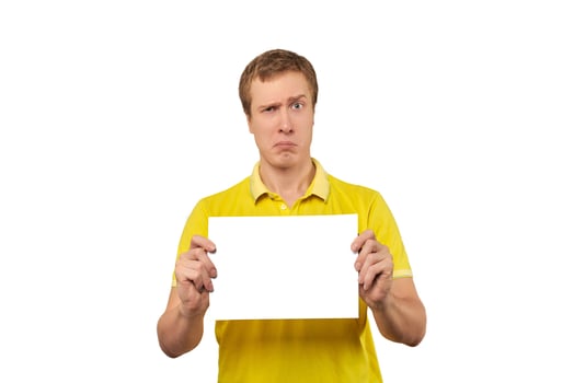 Suspicious guy holding blank paper sheet, paper mockup isolated on white background photo