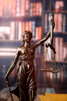 Business and lawyers discussing contract papers with brass scale on desk in office. Law, legal services, advice, justice and law concept picture with film grain effect photo