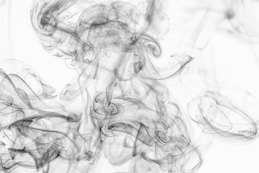 colored smoke isolated on white background photo