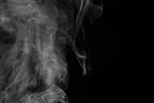 colored smoke isolated on white background photo