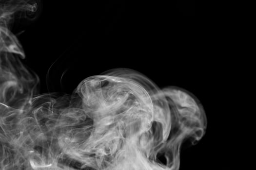 colored smoke isolated on white background photo