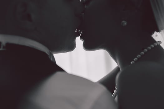 Bride and groom in a hotel room photo