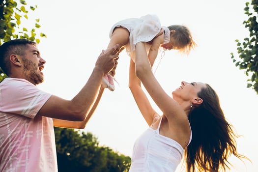 Parents and kid spending time photo