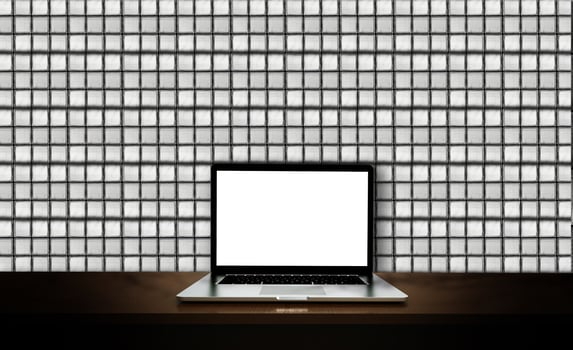 Modern laptop  isolated on brick glass wall background. 3D illustration. photo