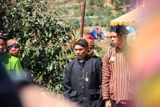 Dieng, Indonesia - August 1, 2015. Dieng Culture Festival, Tourists follow the dreadlocks procession during the Dieng Culture Festival event at Dieng, Banjarnegara district, Central Java photo