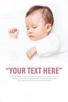 Baby sleeping on the white bed photo