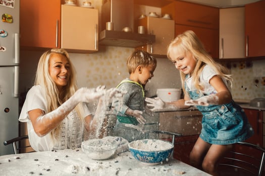 mother and children playing photo