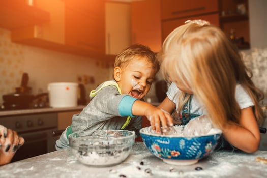 Kids is playing with flour photo
