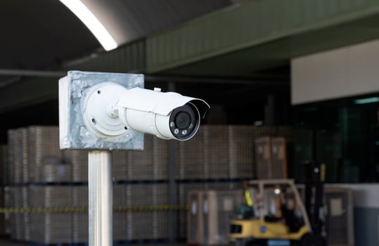 Outdoor white CCTV on pole photo