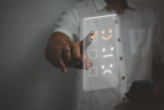 Customer service and Satisfaction concept Business people are touching the virtual screen on the happy Smiley face icon.Business feedback positive rating very impressed concept. photo