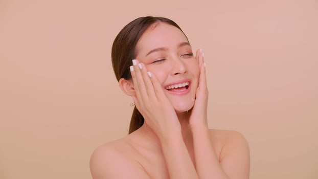 Beautiful face of Asian young woman with natural skin. Portrait of attractive girl with soft makeup and perfectly beautiful skin. photo