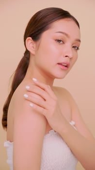 Beautiful face of Asian young woman with natural skin. Portrait of attractive girl with soft makeup and perfectly beautiful skin. photo