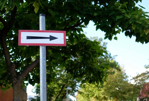 Directional sign with arrow pointing to the right photo