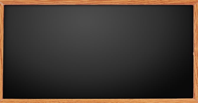 Blackboard with wooden frame on white background photo