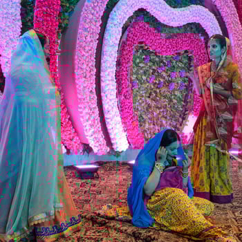 New Delhi, India - August 13, 2022 - Cute Indian dressed up as Lord Krishna and Radha on the occasion of Krishna Janmastami Festival in Delhi India, Radha Krishna performance on Janmashtami festival photo