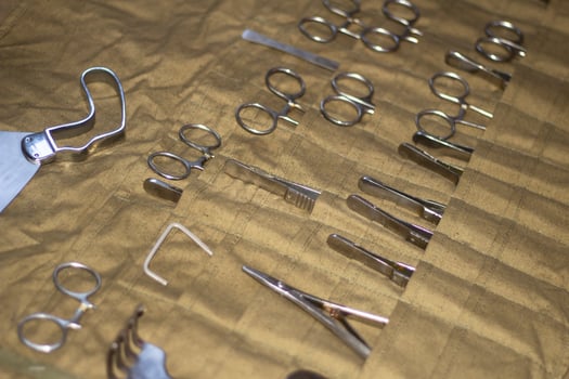 Surgical instruments. Set of medical supplies. Tools made of chrome steel. Medical kit during World War II. Vintage object. photo