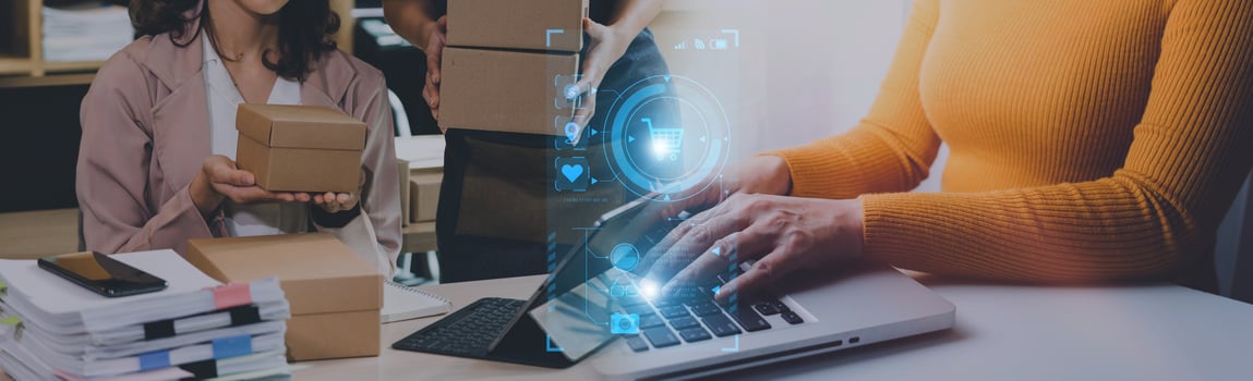 Startup small business entrepreneur or freelance Asian woman using a laptop with box, Young success Asian woman with her hand lift up, online marketing packaging box and delivery, SME concept. photo