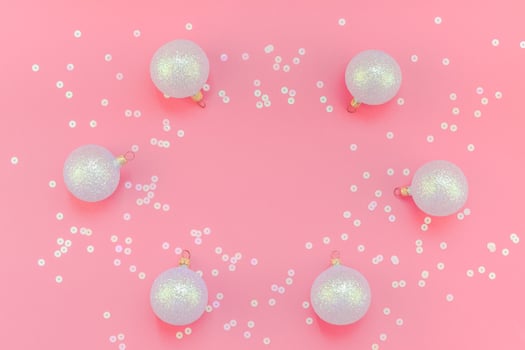Christmas pink flat lay pattern with pearl balls photo