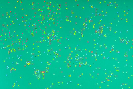 Christmas pattern green paper colorful confetti photo