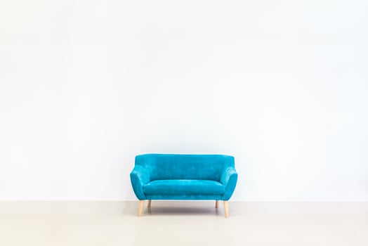 Minimal concept of living interior with blue sofa photo