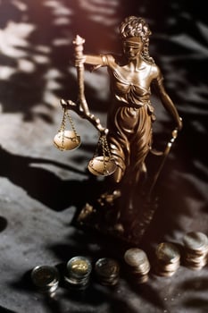 Business and lawyers discussing contract papers with brass scale on desk in office. Law, legal services, advice, justice and law concept picture with film grain effect photo