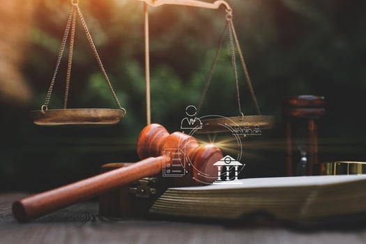 Business and lawyers discussing contract papers with brass scale on desk in office. Law, legal services, advice, justice and law concept picture with film grain effect photo
