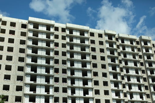 House under construction. Multistorey building. Big construction in the city. photo
