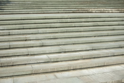 Texture of gray steps, general plan. Construction in the city, Russia. City architecture photo