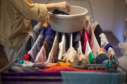 Washing clothes at home. Mom erases things. photo