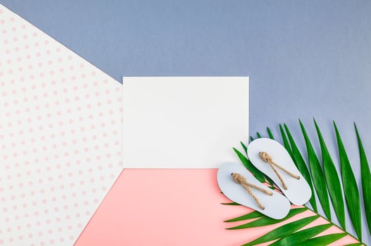 Palm leaves blank paper postcard mockup photo