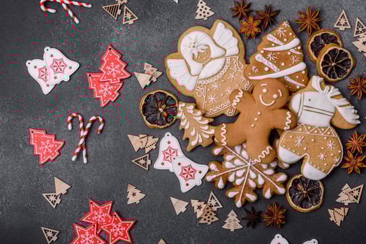 Delicious gingerbread cookies with honey, ginger and cinnamon. Winter composition photo