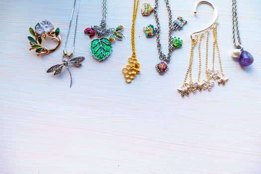 a lot of costume jewelry light summer bijouterie. Copy space photo