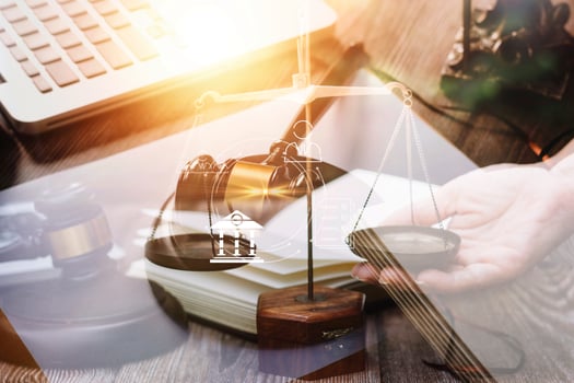 Business and lawyers discussing contract papers with brass scale on desk in office. Law, legal services, advice, justice and law concept picture with film grain effect photo