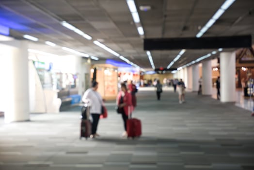Blurred background Traveler at airport terminal blur background photo
