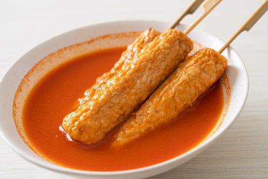 Omuk - Korean fish cake skewer in Korean spicy soup photo