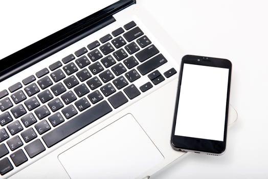 Closeup picture of a keyboard with a phone photo