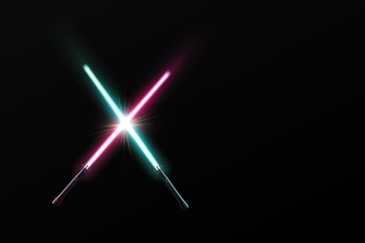 Crossed red and blue light sabers photo