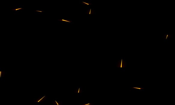 Burning red hot sparks fly from large fire in the night sky. Beautiful abstract background on the theme of fire, light and life. photo