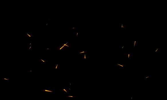 Burning red hot sparks fly from large fire in the night sky. Beautiful abstract background on the theme of fire, light and life. photo
