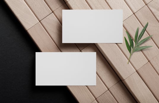 Minimal business card mockup on wooden block photo
