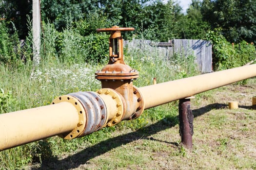 gas line in village in summer day photo